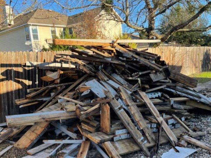 Torn-out lumber and demolition debris pile