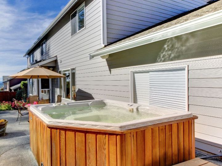Backyard hot tub ready for removal